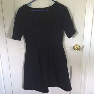Patterned black short sleeved dress.